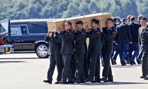 Coffin carried, MH17 victim at Eindhoven, Netherlands