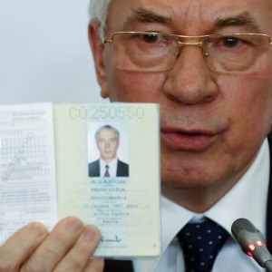 Ukraine's former PM Azarov attends a news conference in Moscow
